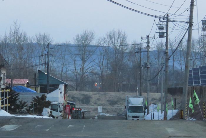 webnews今朝の北見/交差点から奥が無加川の右岸堤防